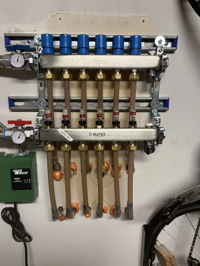 Plumber performing Water Heater Repair at a residential property in Franklin Town